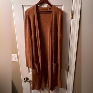 Long sleeved burnt orange cardigan sweater